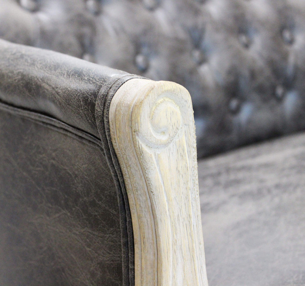 COLEMAN SOFA IN VINTAGE GREY FAUX LEATHER. Dimensions: 107 x 61 x 70 cm h.