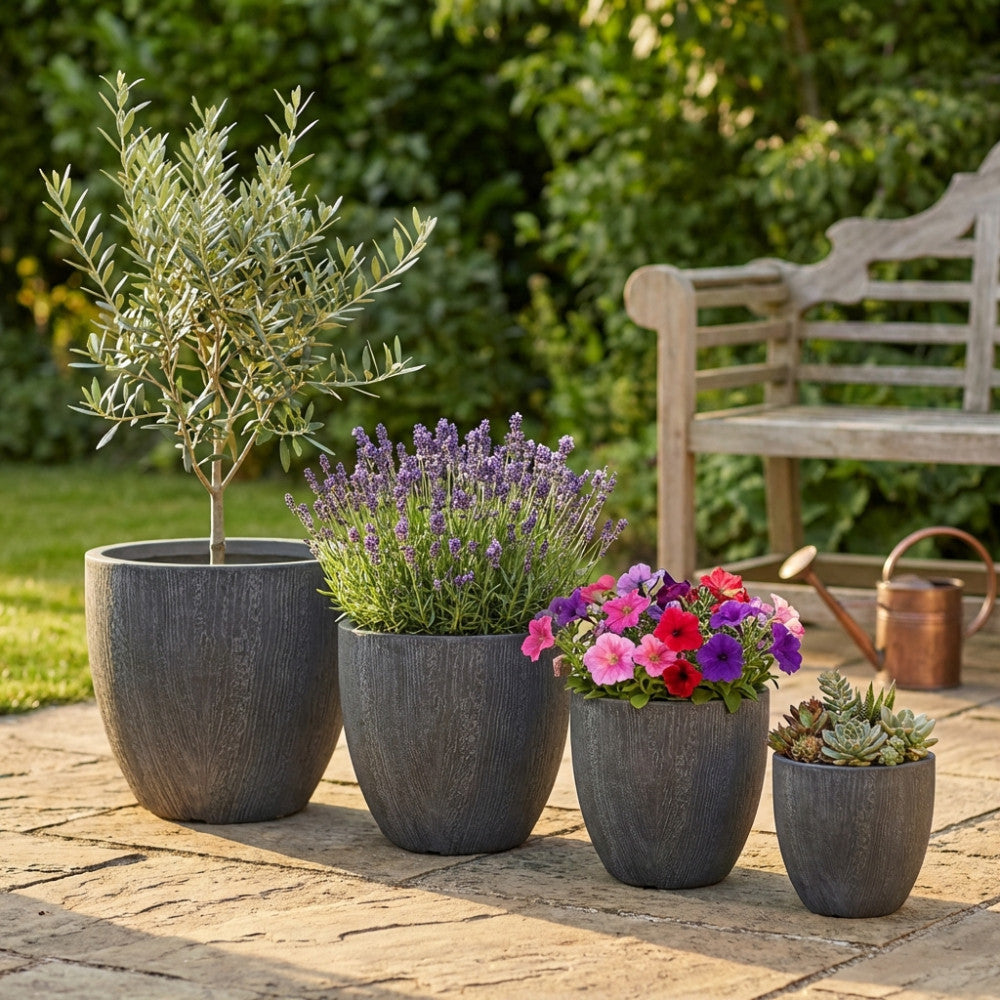 SET OF 4 DAHLIA VASES. Set of 4 GREY synthetic fiber vases. Dimensions: G.44x44x43/M.37x37x35/D.31x31x30.5/XS.25.5x25.5x25. Garden Furniture