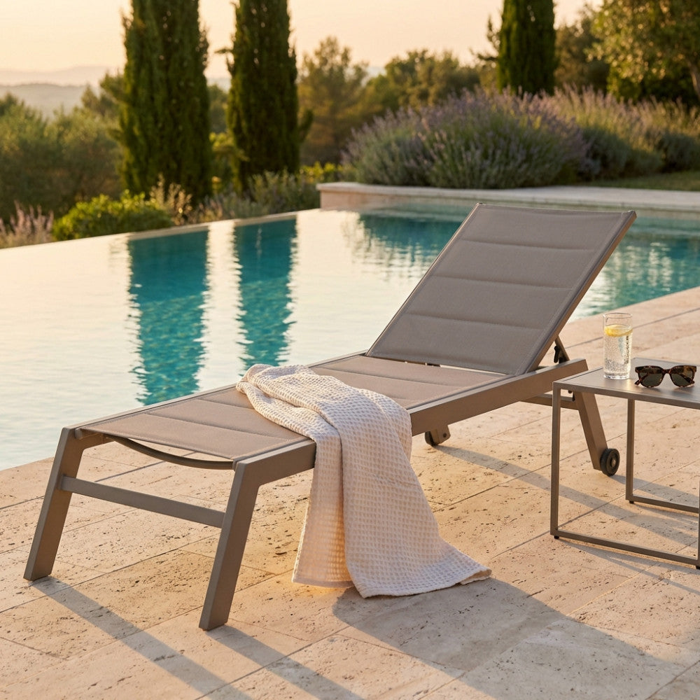 FORMENTERA LOUNGER. Aluminum frame painted WHITE, DOVE GREY, TAUPE, or ANTHRACITE. Padded Textilene in TAUPE, BLACK on anthracite. Dimensions: 198 x 61 x 34/95 cm. Garden Furniture