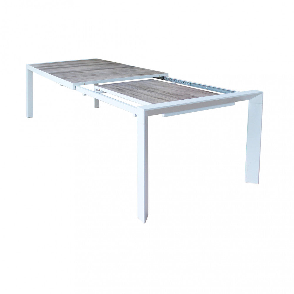 PORTLAND TABLE 175/235 X 100. Structure in ANTHRACITE, TAUPE or WHITE aluminium, table top in GREY wood-effect ceramic in NATURAL taupe. Dimensions: 175/235 x 100 x 75 h cm. Garden Furniture