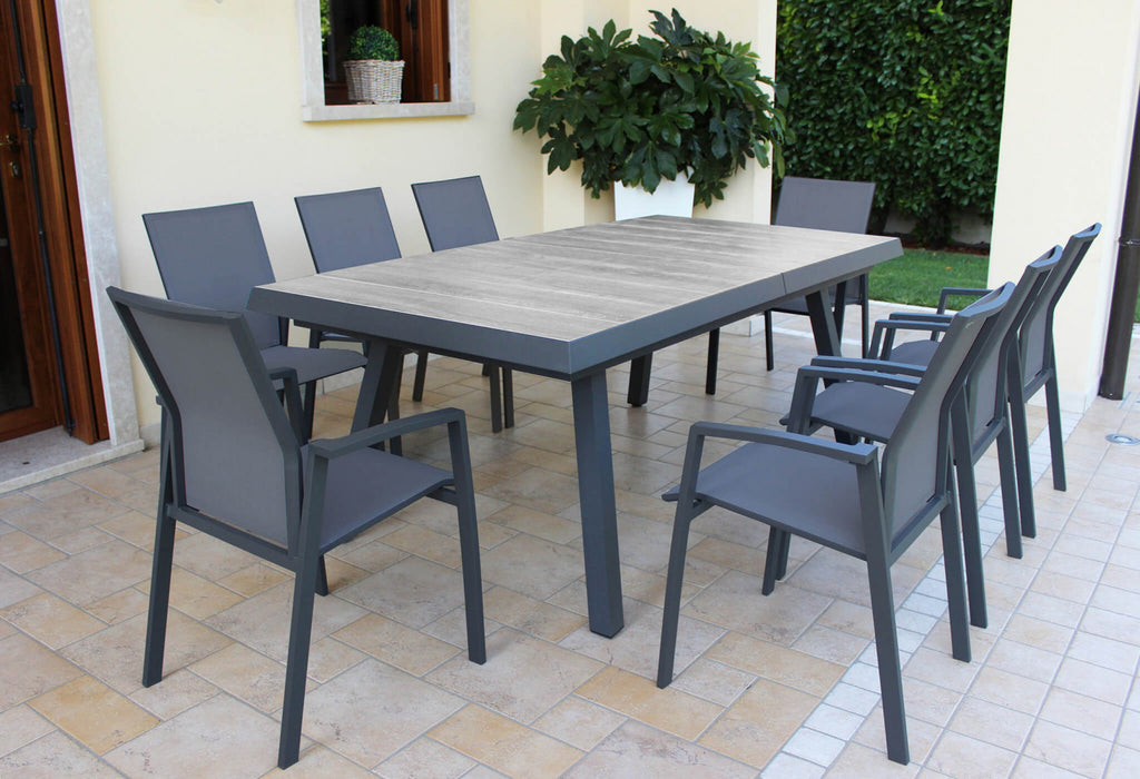 SEATTLE TABLE 205/265 X 105. Structure in ANTHRACITE, TAUPE or WHITE aluminum, table top in GREY wood-effect ceramic in NATURAL taupe. Dimensions: cm 205/265 x 105 x 75 h. Garden Furniture