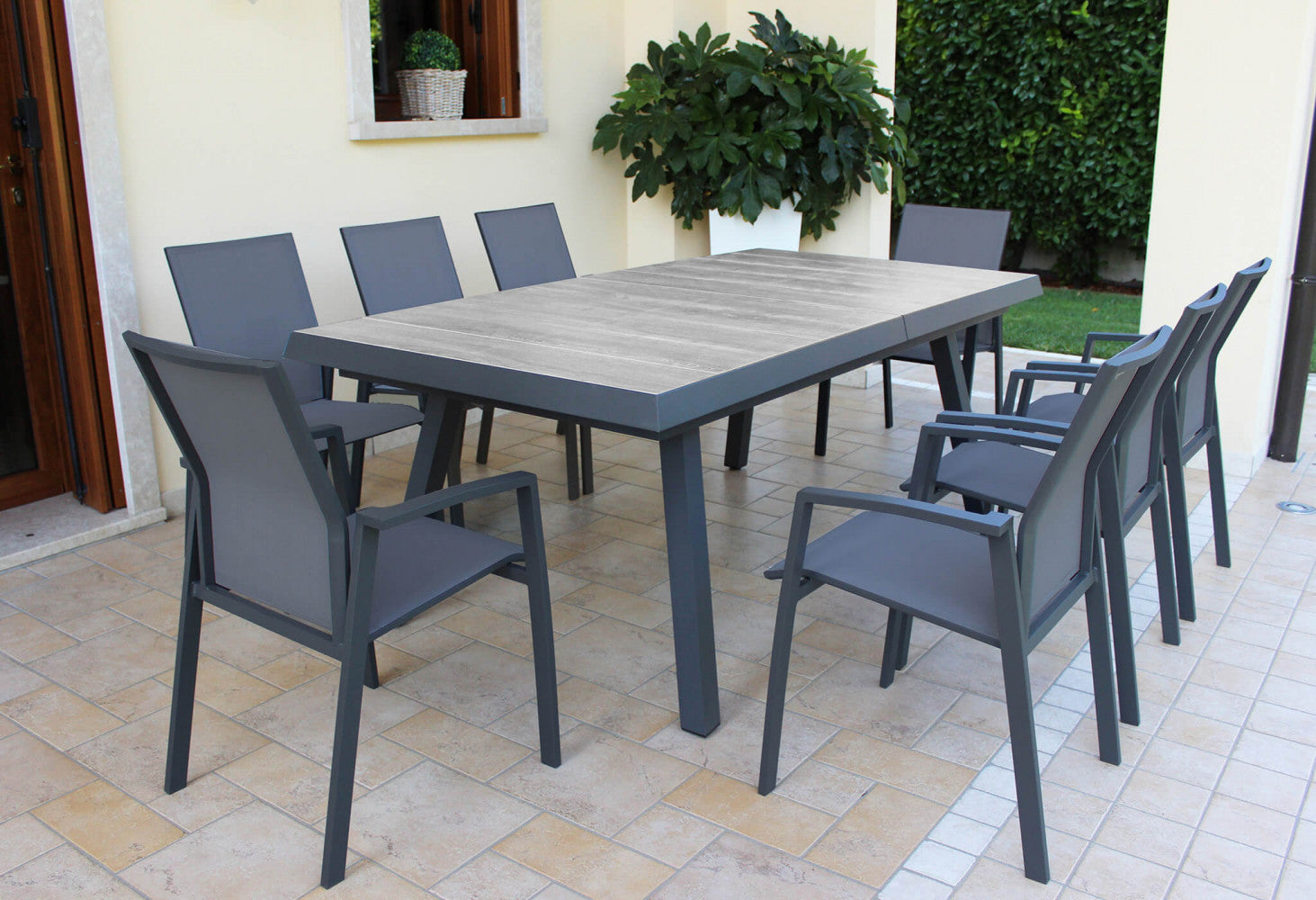 SEATTLE TABLE 205/265 X 105. Structure in ANTHRACITE, TAUPE or WHITE aluminum, table top in GREY wood-effect ceramic in NATURAL taupe. Dimensions: cm 205/265 x 105 x 75 h. Garden Furniture