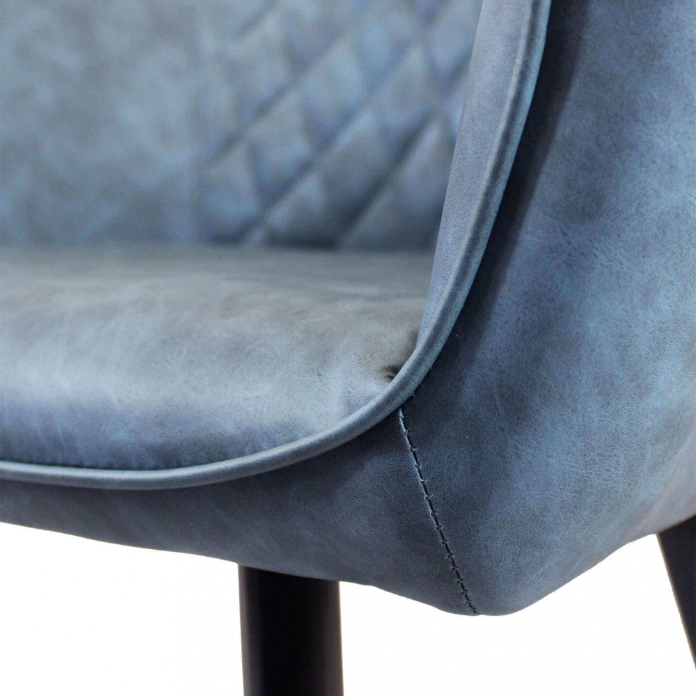 SINDY CHAIR IN FAUX LEATHER. Metal frame, faux leather seat and back. Dimensions: 56 x 60 x 87 cm h.