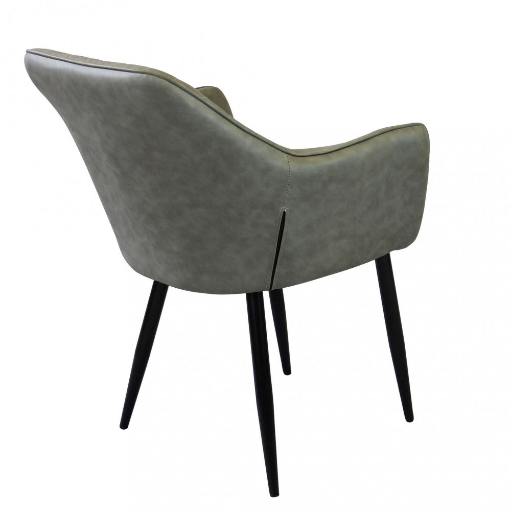 SINDY CHAIR IN FAUX LEATHER. Metal frame, faux leather seat and back. Dimensions: 56 x 60 x 87 cm h.