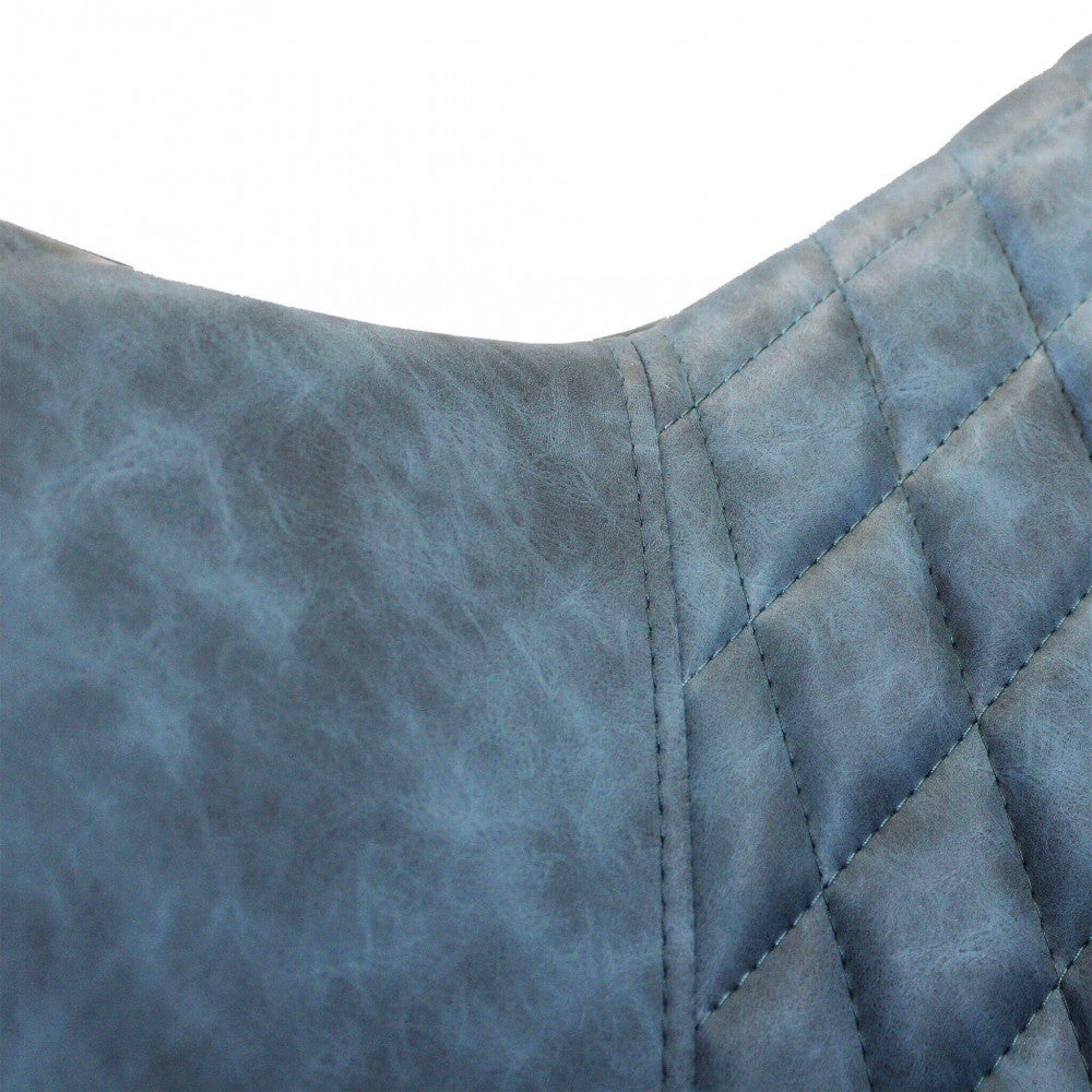 SINDY CHAIR IN FAUX LEATHER. Metal frame, faux leather seat and back. Dimensions: 56 x 60 x 87 cm h.