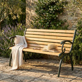 REAL CAST IRON BENCH. Wooden and cast iron bench with 12-slat seat and backrest. Dimensions: 126 x 60 x 77 cm. Garden furniture.