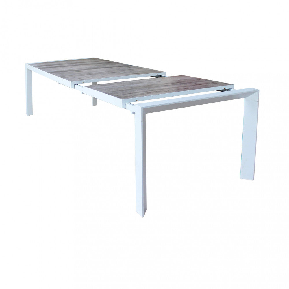 PORTLAND TABLE 175/235 X 100. Structure in ANTHRACITE, TAUPE or WHITE aluminium, table top in GREY wood-effect ceramic in NATURAL taupe. Dimensions: 175/235 x 100 x 75 h cm. Garden Furniture