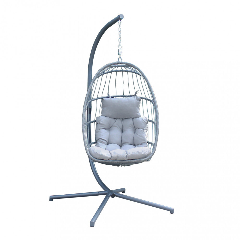DONDOLO SCIROCCO PIEGHEVOLE. Struttura in metallo grigio seduta in alluminio e metallo in wicker GRIGIO e alluminio corde ò6,5 mm cuscino poliestere in tinta Dimensioni: Struttura ò 95 x 196h seduta 73 x 64 x 108. Arredo Giardino