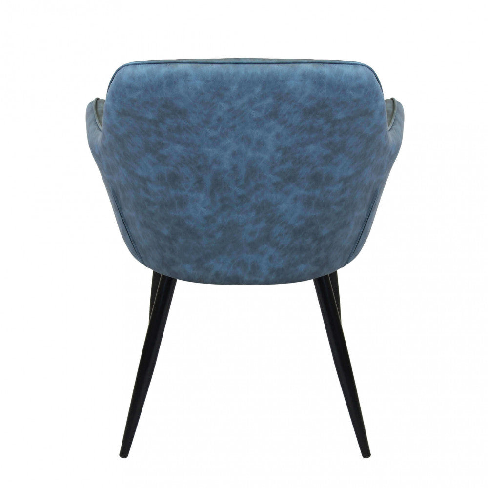 SINDY CHAIR IN FAUX LEATHER. Metal frame, faux leather seat and back. Dimensions: 56 x 60 x 87 cm h.