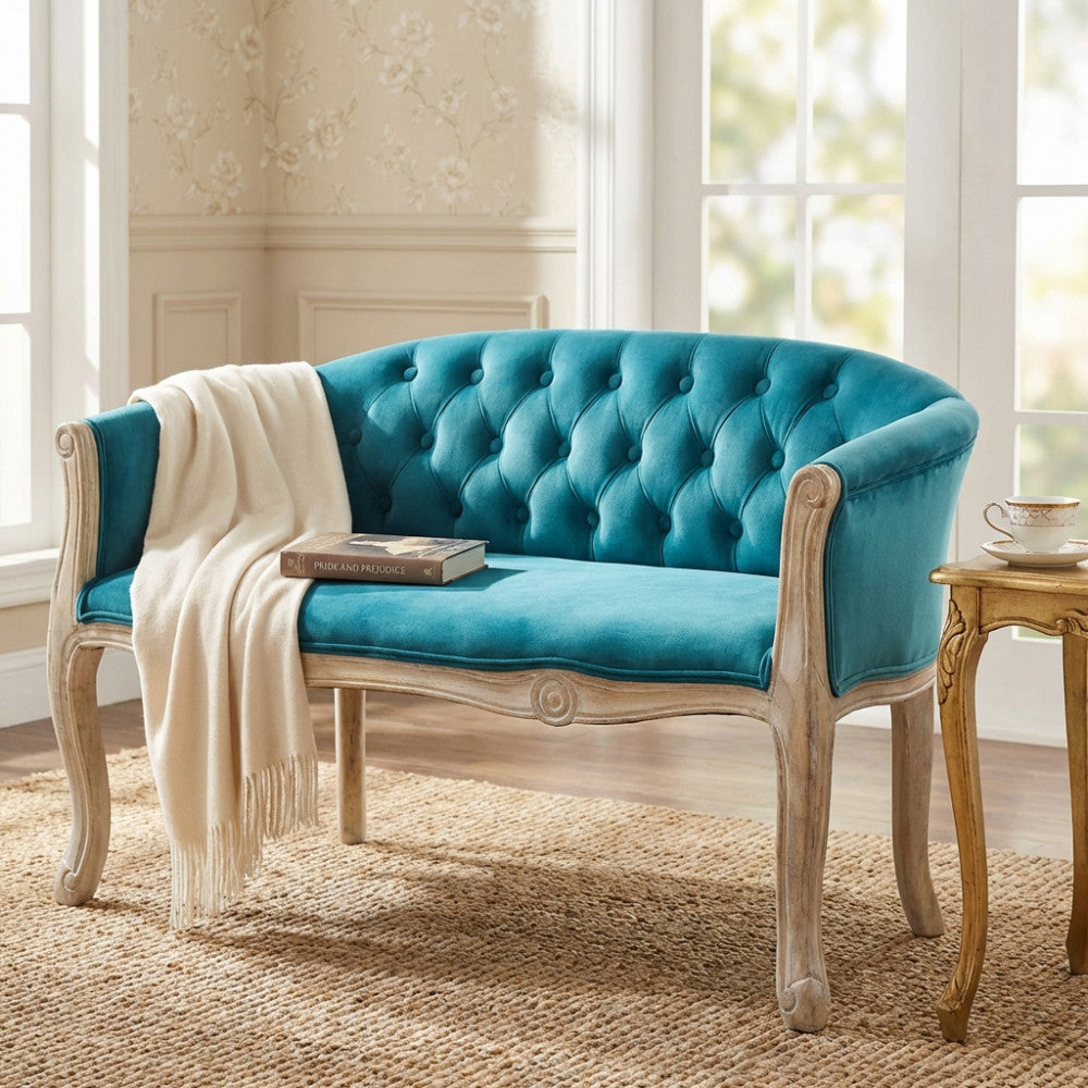 DIVANO COLEMAN IN VELLUTO BLU. Dimensioni: cm 107 x 61 x 70 h.