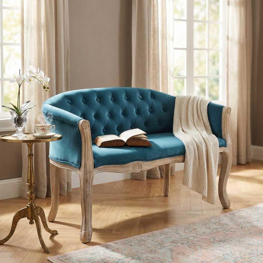 DIVANO COLEMAN IN VELLUTO BLU. Dimensioni: cm 107 x 61 x 70 h.