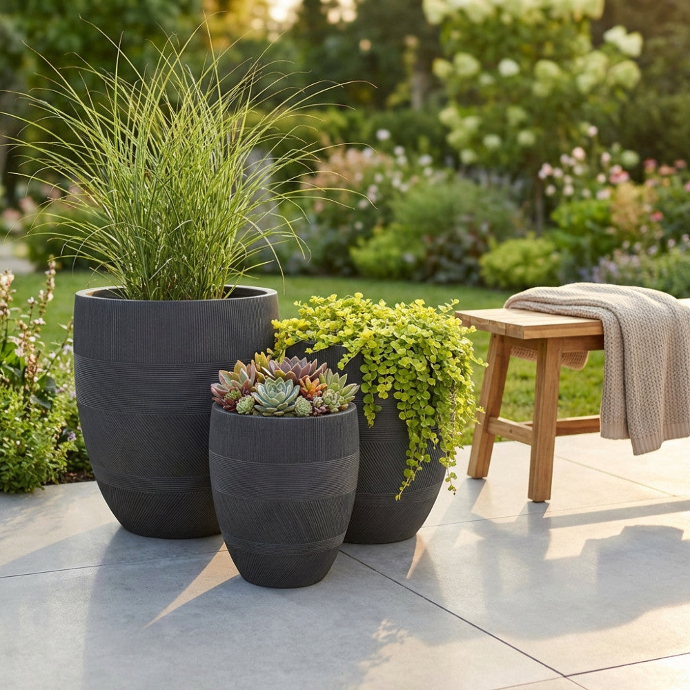 POPPY VASES SET. Set of 3 synthetic fiber vases in TAUPE, BEIGE, or DARK GREY. Dimensions: W 43.5 x 43.5 x 50 cm / M 35.5 x 35.5 x 41 cm / D 27 x 27 x 32 cm. Garden Furniture