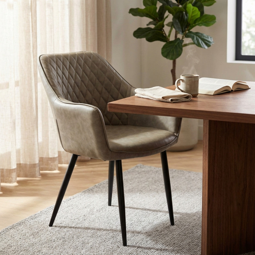 SINDY CHAIR IN FAUX LEATHER. Metal frame, faux leather seat and back. Dimensions: 56 x 60 x 87 cm h.