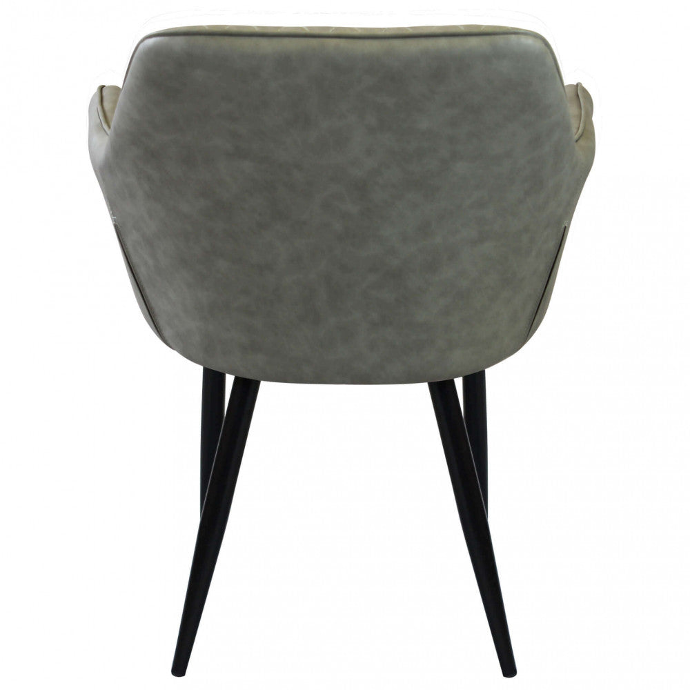 SINDY CHAIR IN FAUX LEATHER. Metal frame, faux leather seat and back. Dimensions: 56 x 60 x 87 cm h.