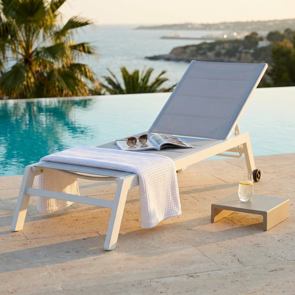 FORMENTERA LOUNGER. Aluminum frame painted WHITE, DOVE GREY, TAUPE, or ANTHRACITE. Padded Textilene in TAUPE, BLACK on anthracite. Dimensions: 198 x 61 x 34/95 cm. Garden Furniture